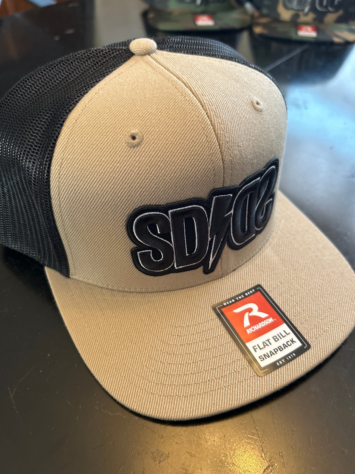 Flat bill trucker hat