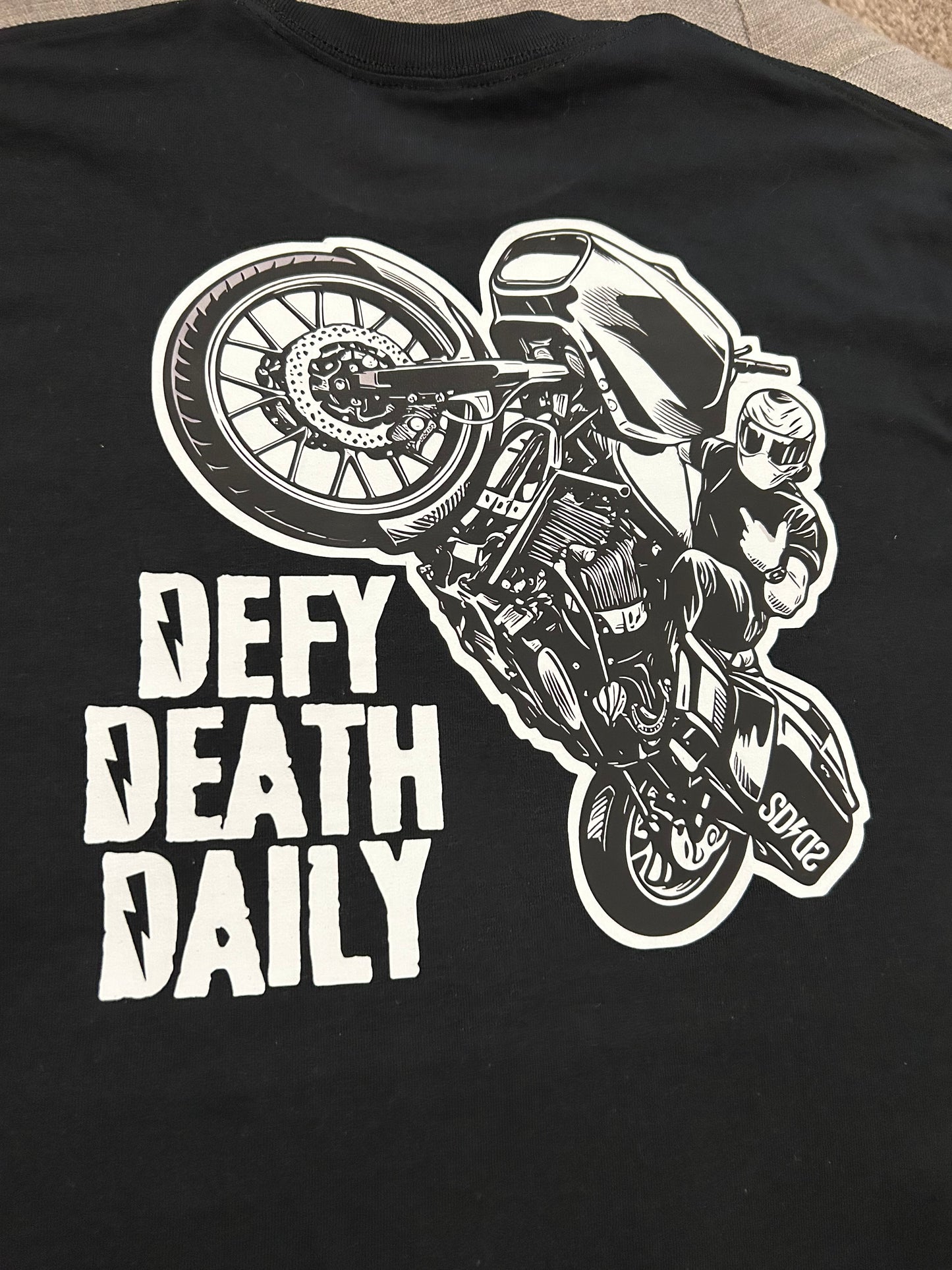 Defy Death Daily wheelie t-shirt
